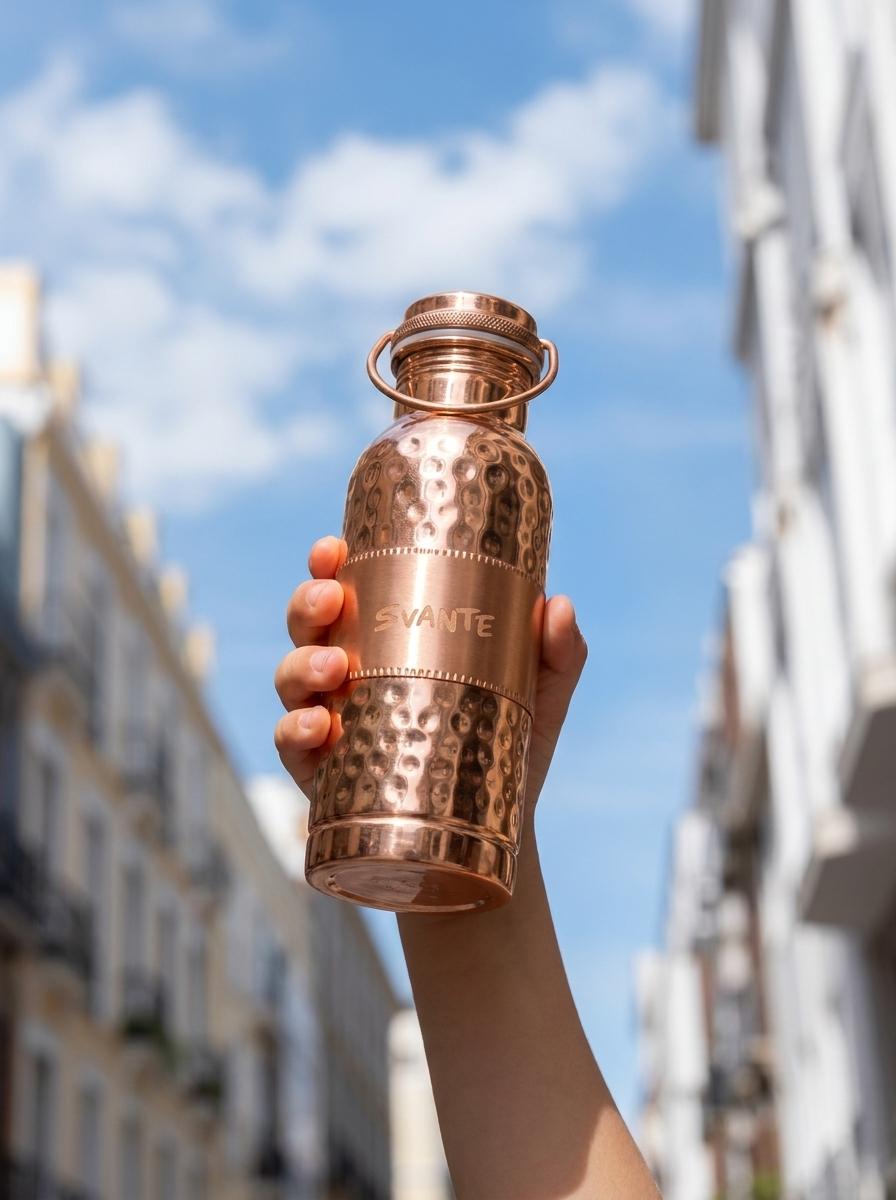Close-up of hammered copper bottle surface